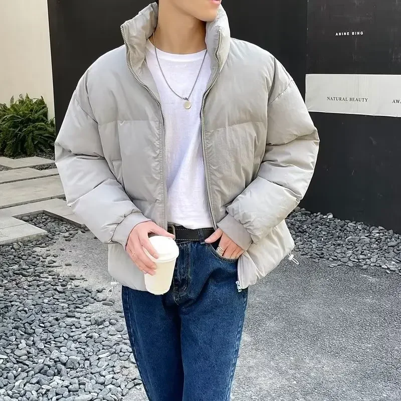Koreanische Version der einfachen, einfarbigen, warmen, gepolsterten Freizeitjacke, dicke, lockere, winddichte, mit Baumwolle gepolsterte Kleidung für Herren im Winter