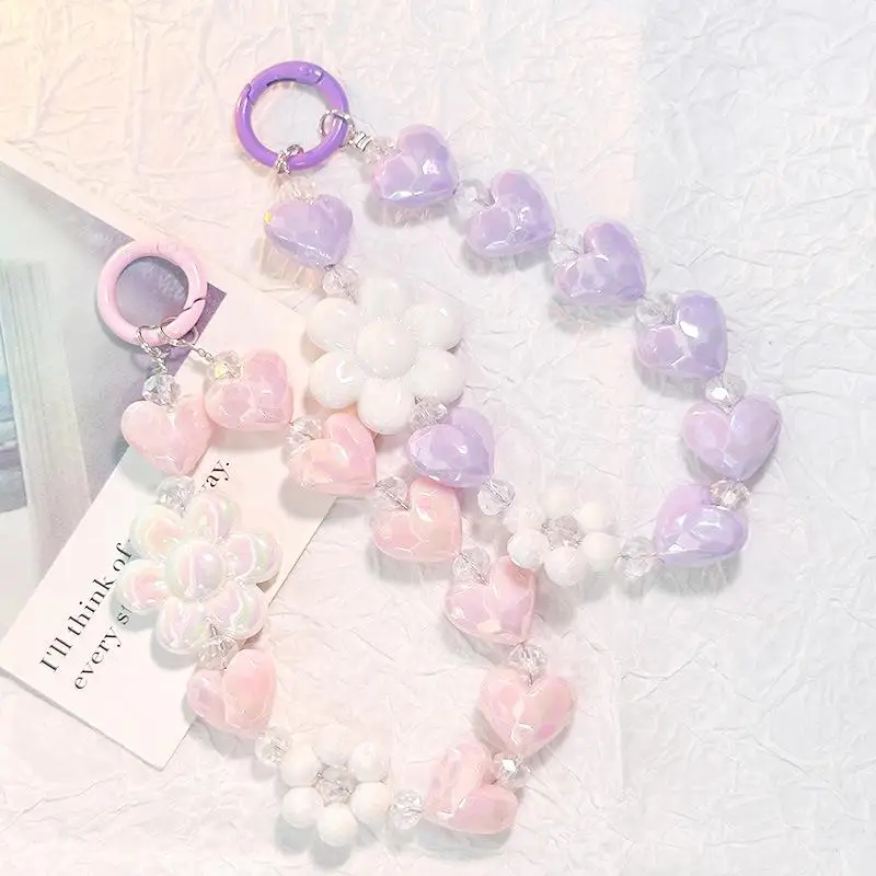 Kurzes Handgelenkseil mit buntem Blumenkettenanhänger, Anti-Verlust-Schutz, süßes Handy-Lanyard mit Blumen- und Herzperlen. – Detail 4