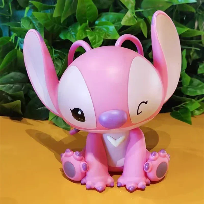 

18-22cm Disney Stitching Angel Piggy Anime Money Box Pvc Action Model Kawaii Doll Decoration Collection Children's Toy Gifts