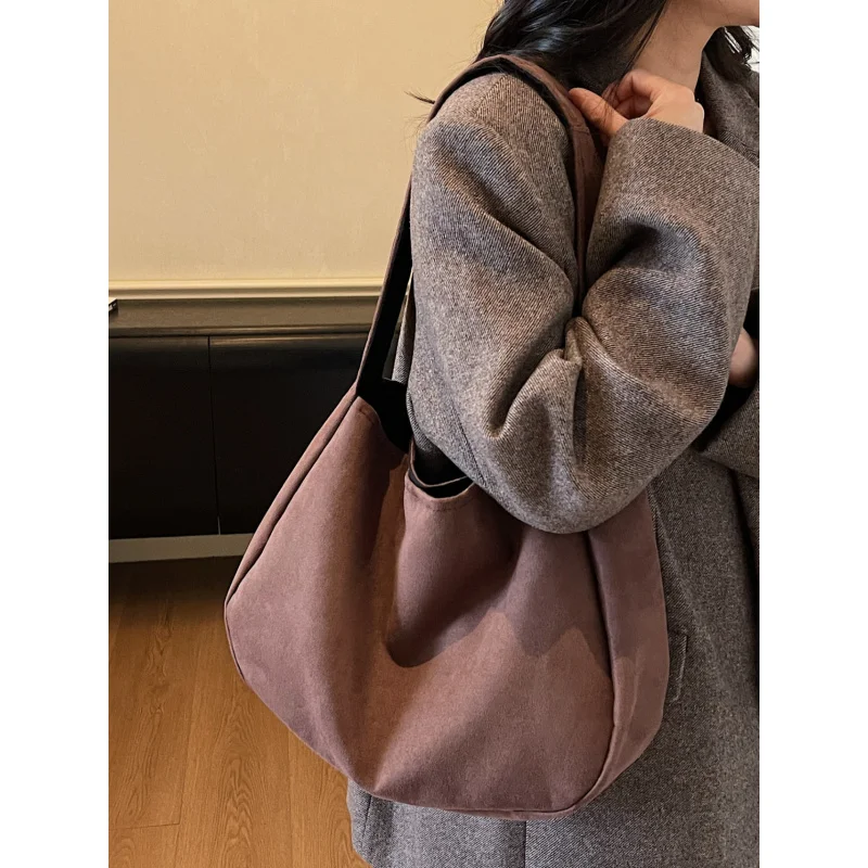 

Women's suede bag, simple casual shoulder bag for daily commuting, versatile dumpling bag, black soft bag, underarm bag
