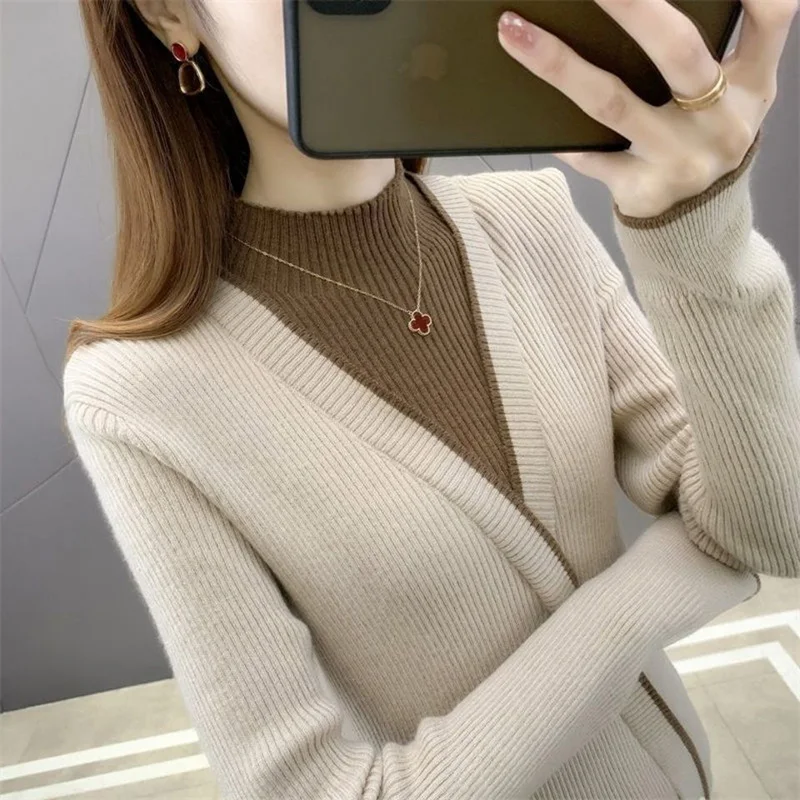 Moda medio cuello alto empalmado falso dos piezas suéteres ropa de mujer 2022 otoño nuevos suéteres sueltos de viaje Casual Tops