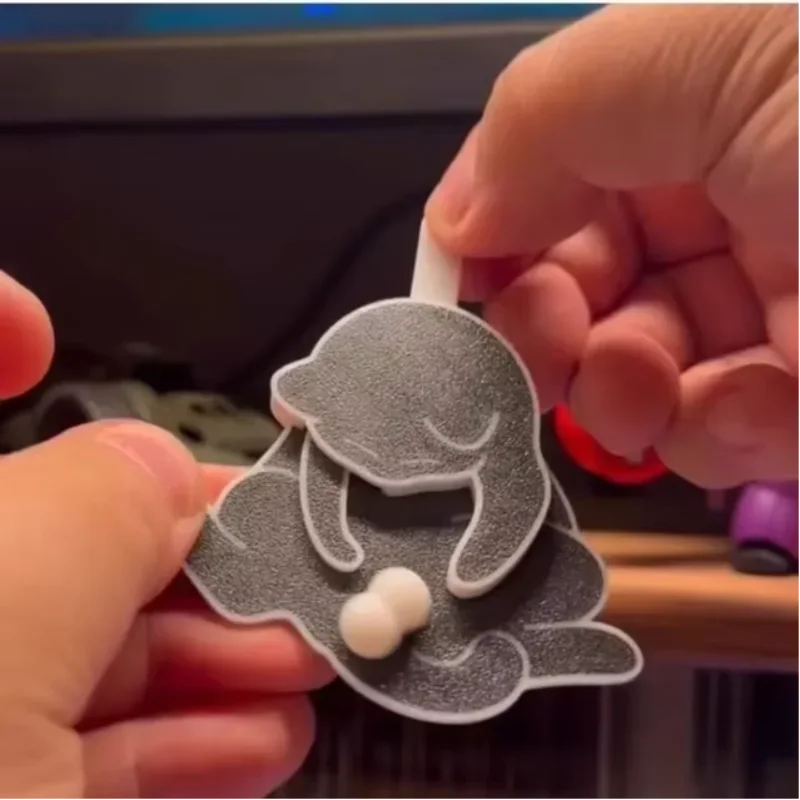 Kreativer Pull Play Egg Cat Anhänger Niedlicher und bizarre drehbarer Taschenanhänger Rucksack Geschenkspielzeug