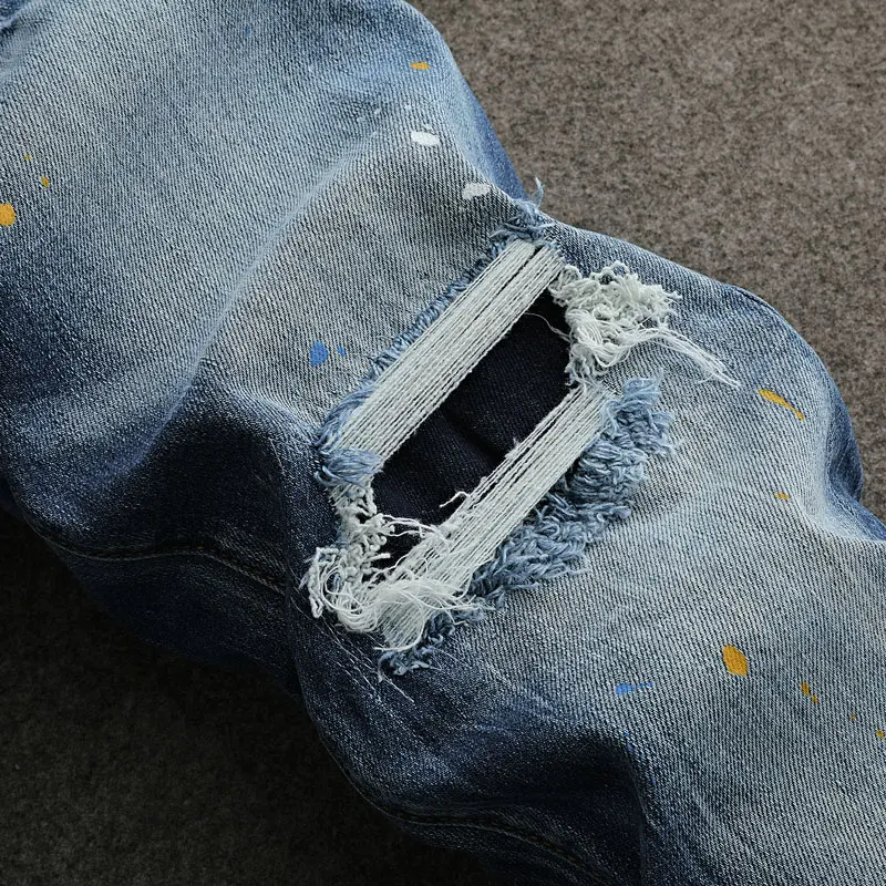 

Fashion Vintage Men Jeans Retro Blue Y2KElastic Skinny Fit Hole Ripped Jeans Men Painted Designer Hip Hop Denim Pencil Pants Hom