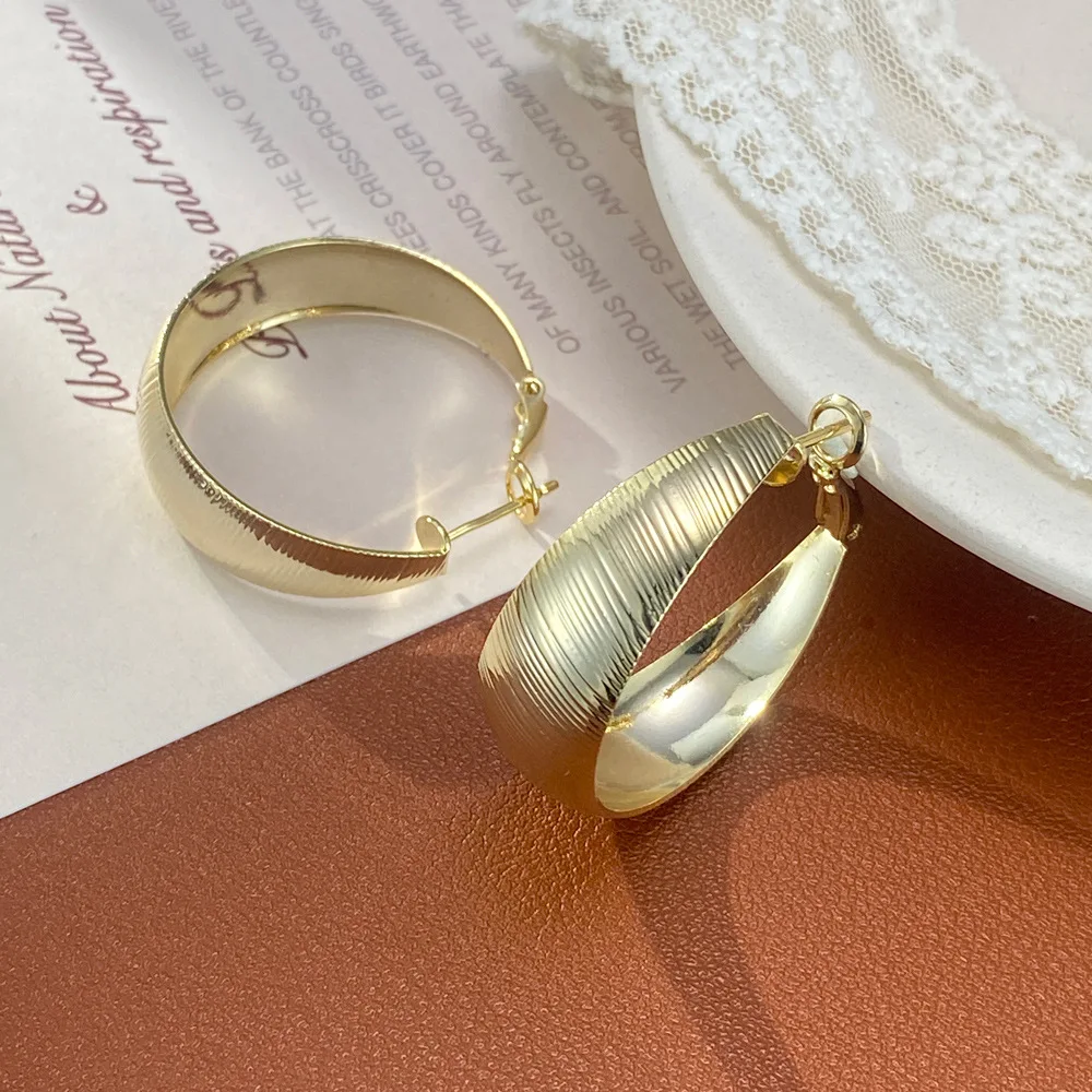 Exaggerated striped texture earrings temperament simple unique earrings women