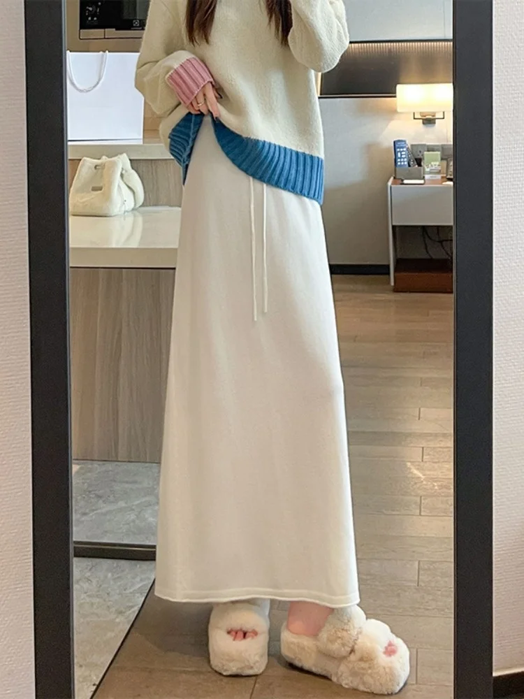 กระโปรงไหมพรมถักสไตล์เรโทรระดับไฮเอนด์ ทรงเอไลน์แบบสบายๆ สำหรับผู้หญิง กระโปรงทรงห่อแบบลำลอง ใส่ได้ทั้งฤดูใบไม้ร่วงและฤดูหนาว บุด้วยโพลีเอสเตอร์อย่างดี ให้ความรู้สึกสบาย