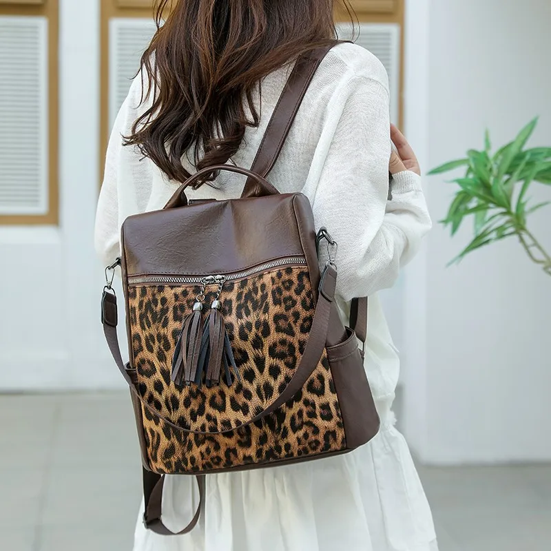 Mochilas de moda de PU con cremallera, diseño de estampado de leopardo de gran capacidad, bolsos de bolsillo con cremallera Interior de alta calidad 2025 para mujer