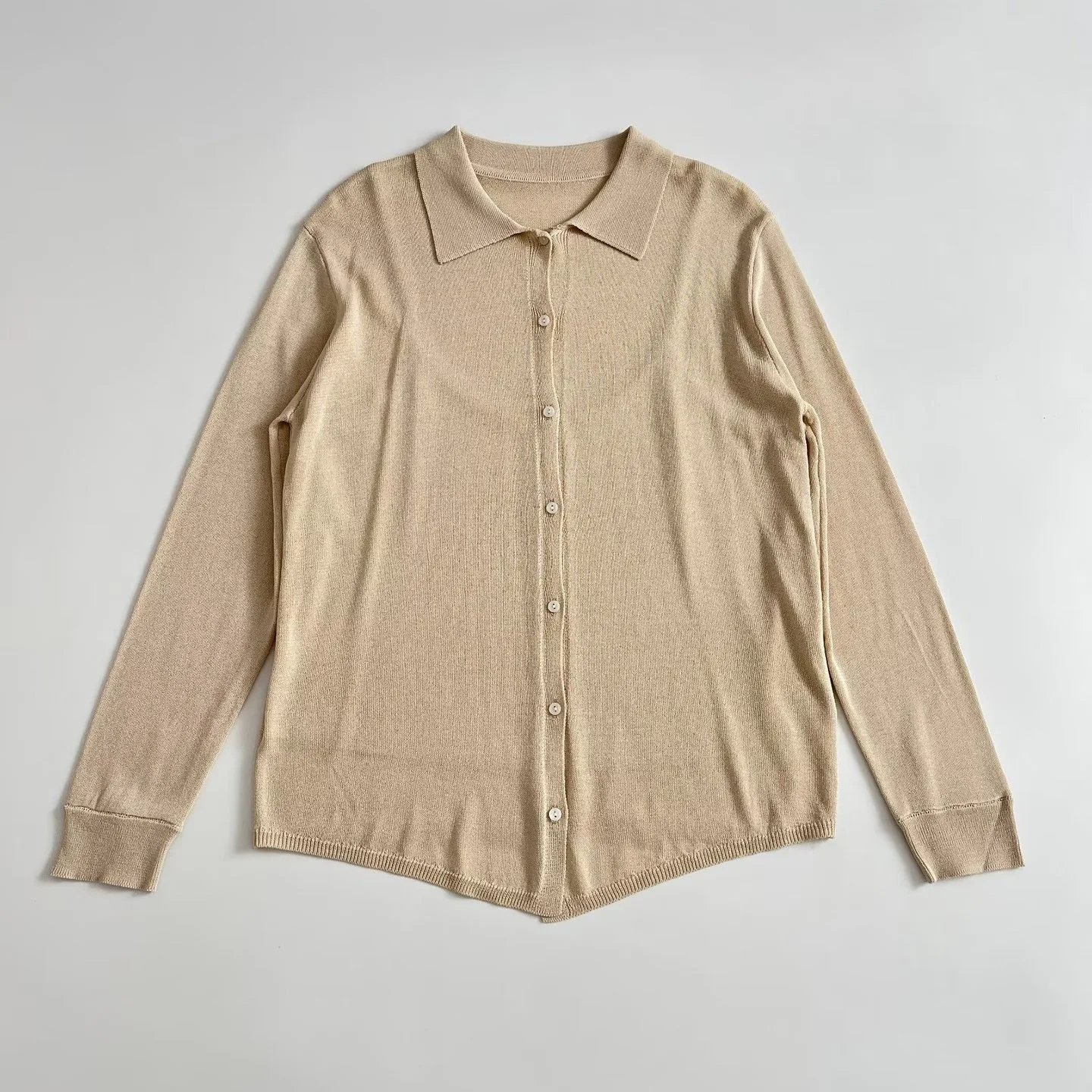 

Withered European And American Style New Thin Knitted Cardigan Versatile Lapel Buckle Decoration Casual Top Women's Sweater