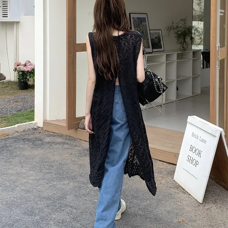 ชุดเดรสชายหาดกลวงออก สาวเผ็ดยุโรปและอเมริกา ทรงยาว คอกลม สไตล์แขนกุด เสื้อสเวตเตอร์ถัก กระโปรงเสื้อกั๊ก