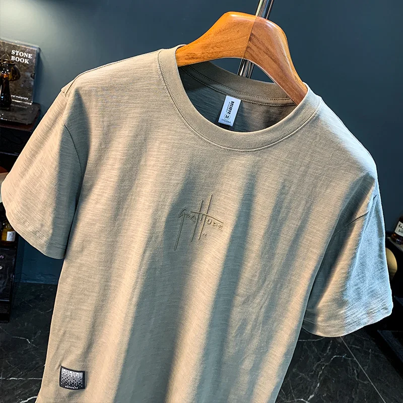 T-shirt men's 2025 summer new fashion simple round neck breathable loose short sleeved comfortable
