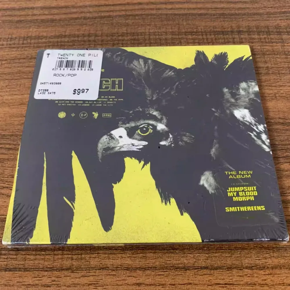 

Оригинальный альбом Trench с всеми 14 треками, такими как My Blood & Chlorine CD, для любителей Twenty One Pilots, совершенно новая поп-рок музыка.