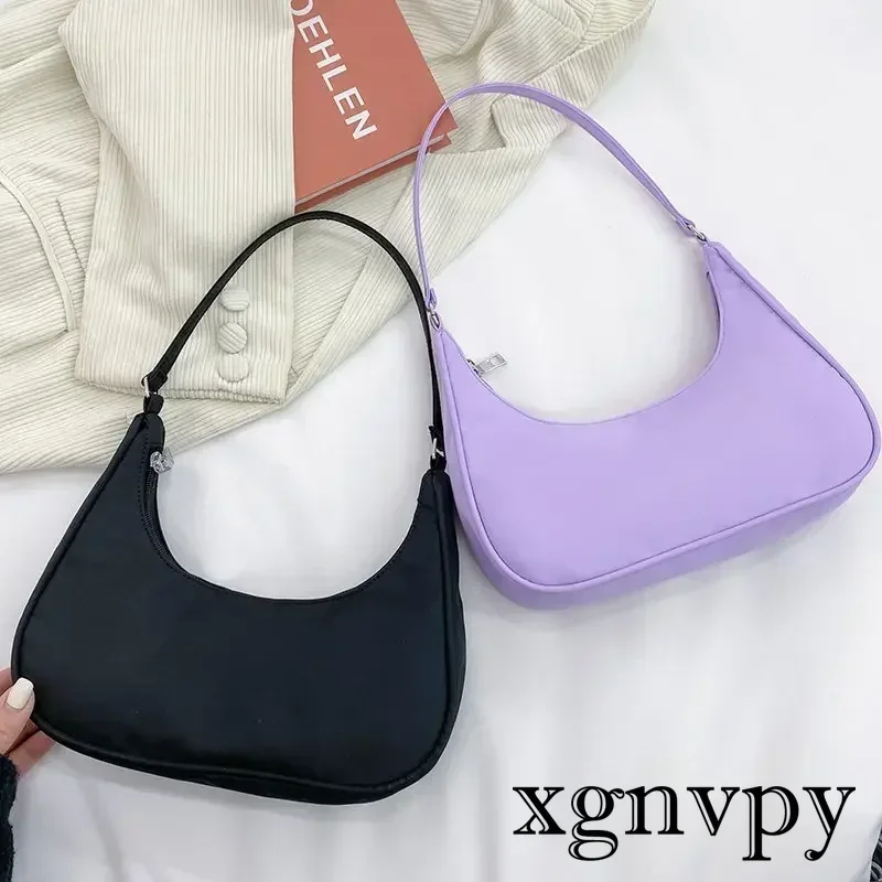 

xgnvpy Korean version of the new fashion trend urban simple dumpling type handbag bag nylon solid color one shoulder armpit bag