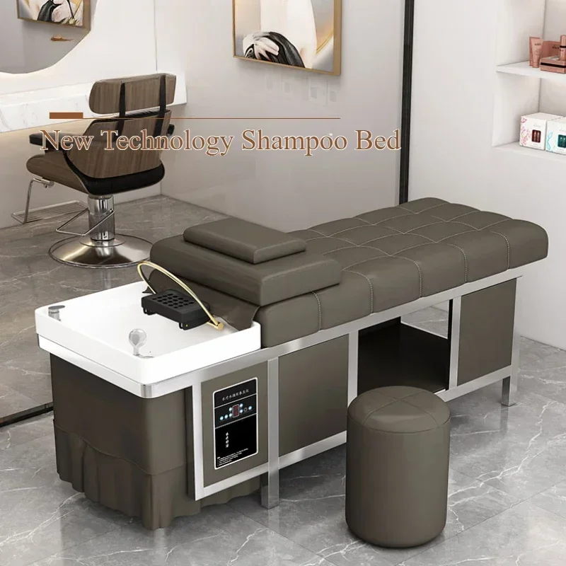 Barbershop's stainless steel shampoo bed. Beauty salon's Thai-style water circulation massage bed.