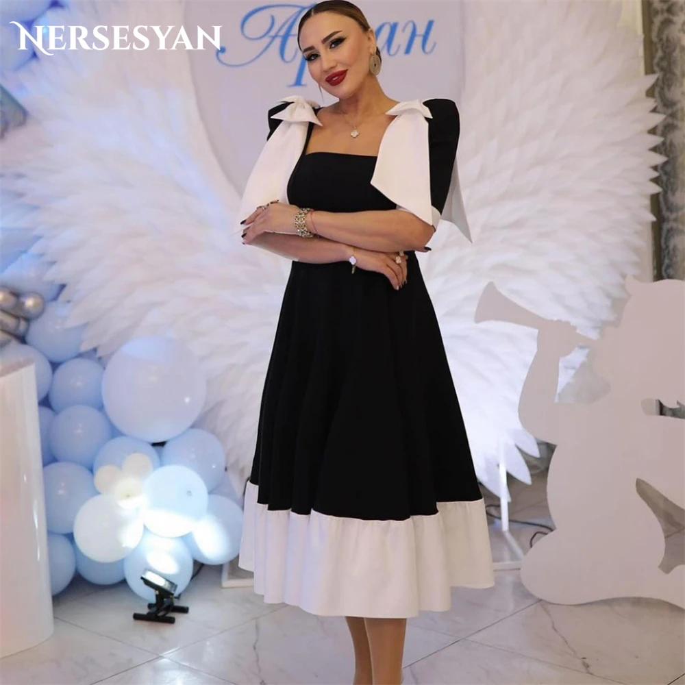 

Nersesyan White And Black Satin Formal Evening Dresses Bow Straps A-Line Tea Length Prom Dress Dubai فساتين السهرة Party Gowns