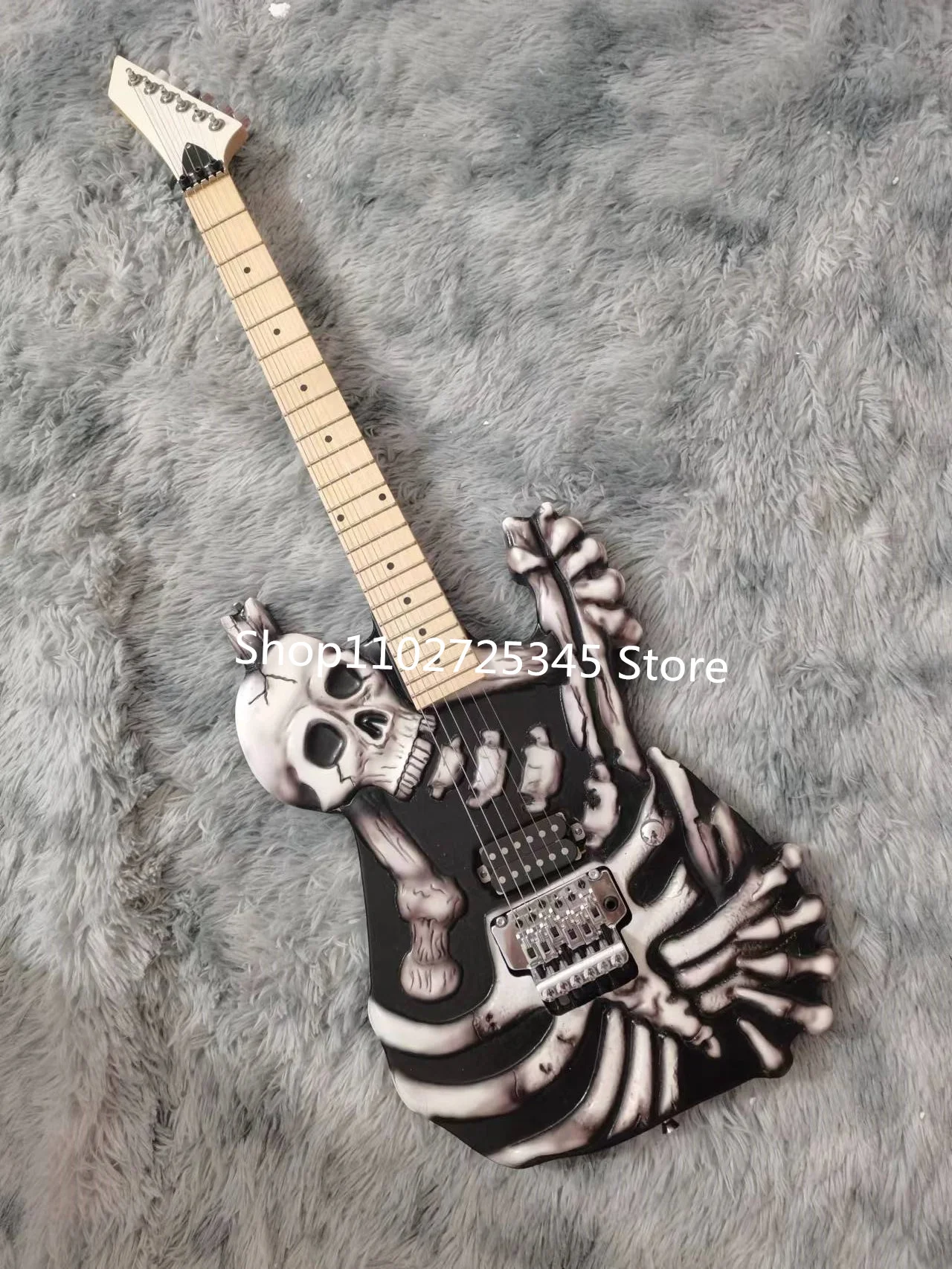 

6-string skull electric guitar, maple fingerboard, silver accessories, tremolo system, free shipping