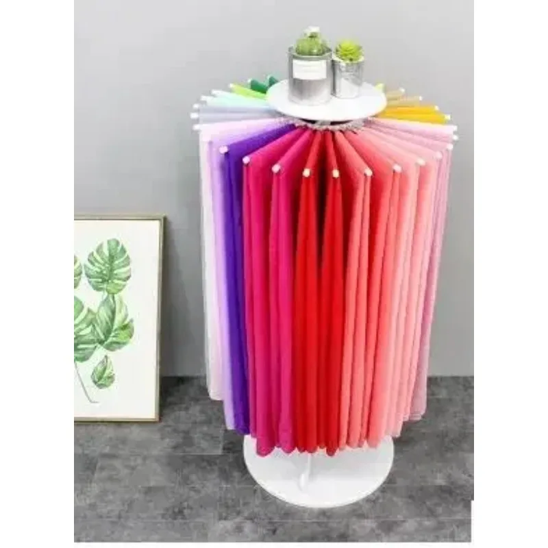 

Scarf shelf. Floor display rack. Display shelves of silk scarves. Multi-functional circular rotating frame