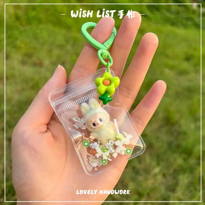 

Nuevo Erchuang peluche Mini Labubu escombros vinilo Licht grano bebé bolsa para caminar colgante nne llavero regalo