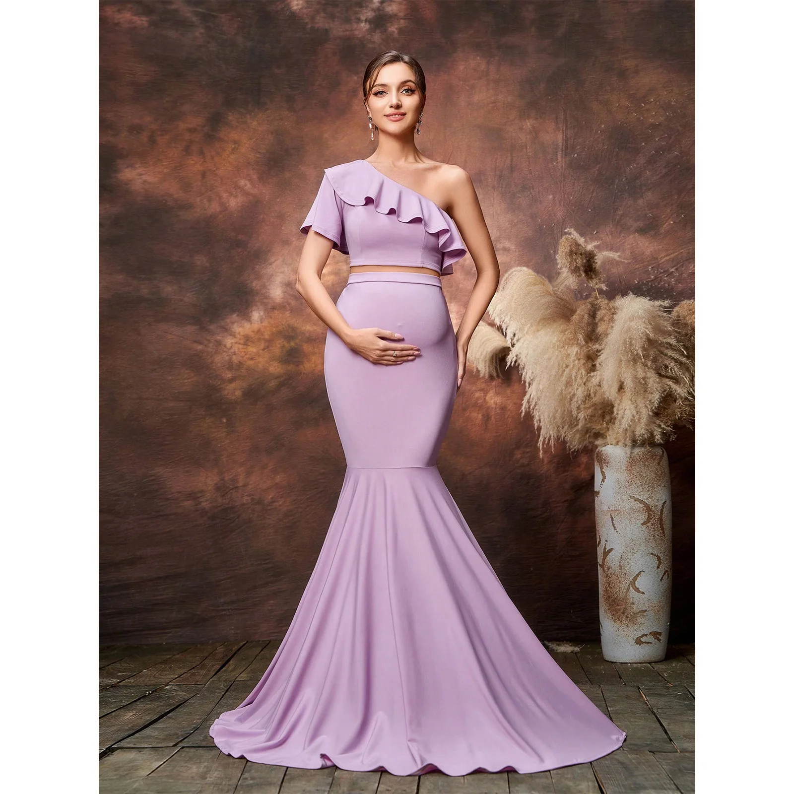 

Элегантное вечернее платье для беременных из двух частей, состоящее из укороченного топа с рюшами и юбки-русалки, идеально подходит для вечеринки в честь рождения ребенка.