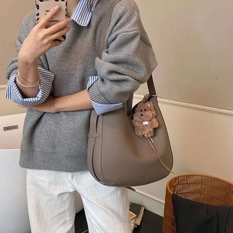 

Elegant Women's Tote Bag, Durable Leather Material, Messenger Inspired, Luxury Brand Designer Creation