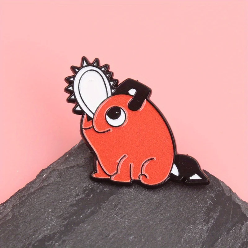 Chainsaw Cutie Pin - Fiery Orange Critter with Cartoonish Saw-Crown & Playful Tail [Quirky Monster Jewelry]