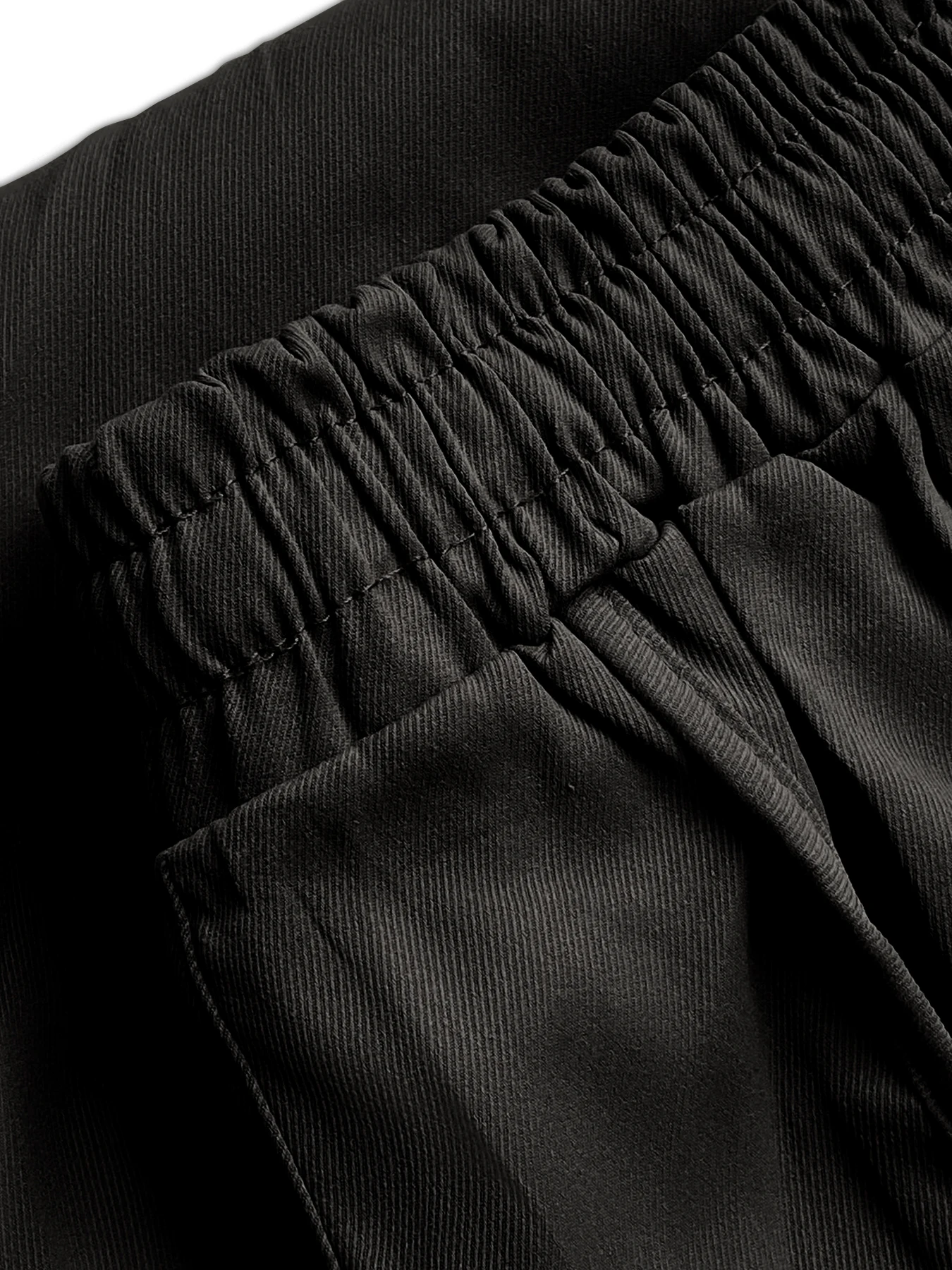 Pantaloni sportivi casual abbinati ai colori alla moda casual da uomo Tasca in tessuto con cuciture Piedi Pantaloni casual Tasca cargo Tuta ampia