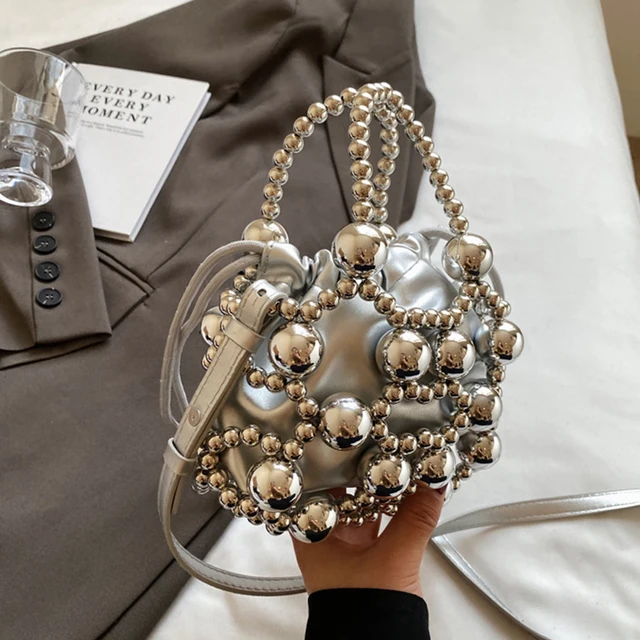 Luksusowe torebki z koralikami Hollow Woven Pearls Bags for Women Fashion Drawstring Shoulder Bag Lady Evening Bag Party Wedding Clutch