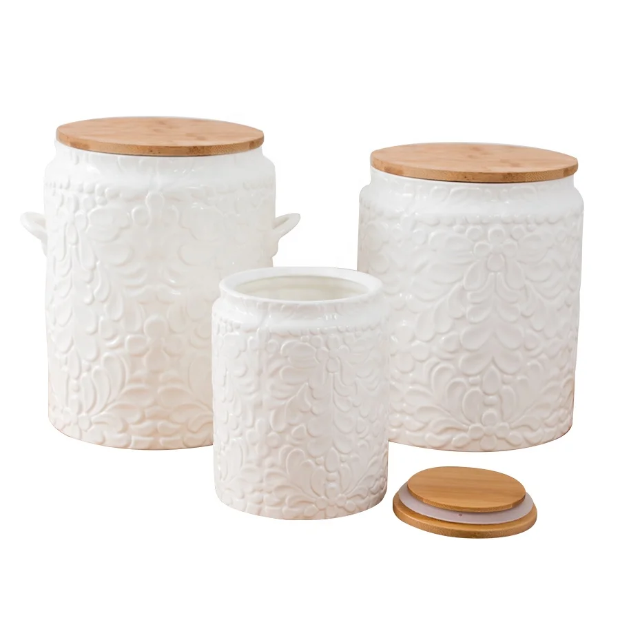 

Custom Embossed Porcelain Food Storage Container Ceramic Tea Coffee Sugar Canister Set with Bamboo Lid