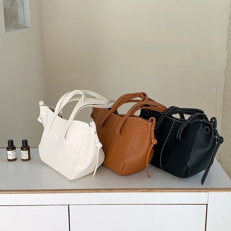 2024 soft leather PU wing bag, South Korea's new large-capacity handbag, commuter women to work