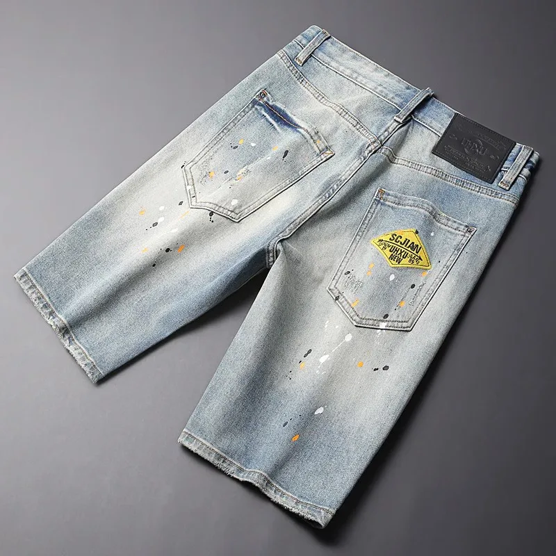 Newly Fashion Designer Men Jeans Summer Trends Retro Blue Elastic Painted Ripped Short Jeans Hip Hop Vintage Denim Shorts Men