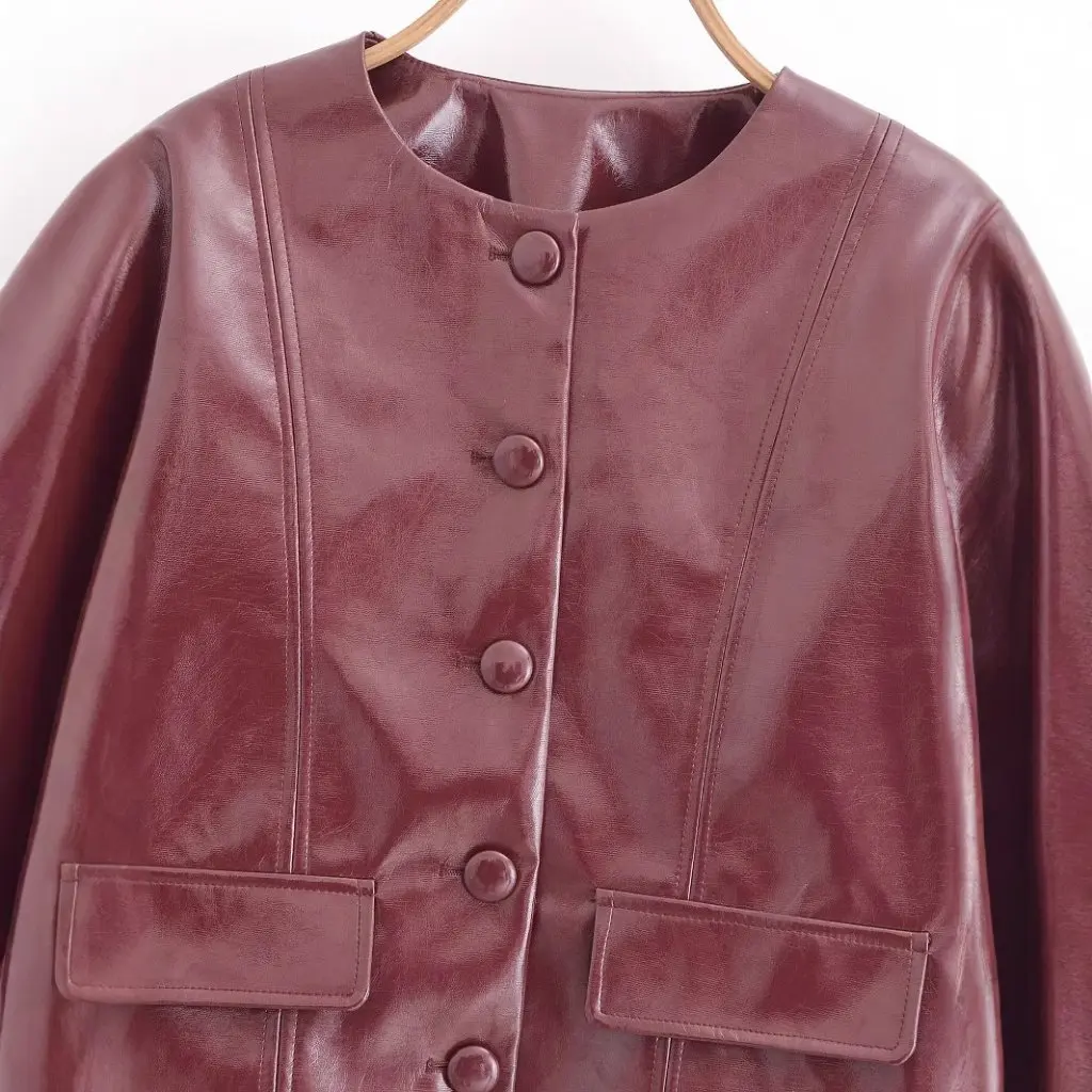Moda europea y americana Color sólido cuello redondo chaqueta de cuero de imitación abrigo de mujer de manga larga primavera nuevo A769085