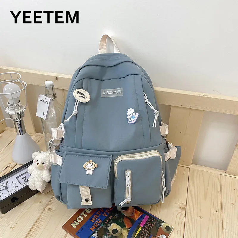 New Cute Girl Backpack Campus Large Capacity Schoolbag Junior High School Students Cute Backpack with Medal Pendant