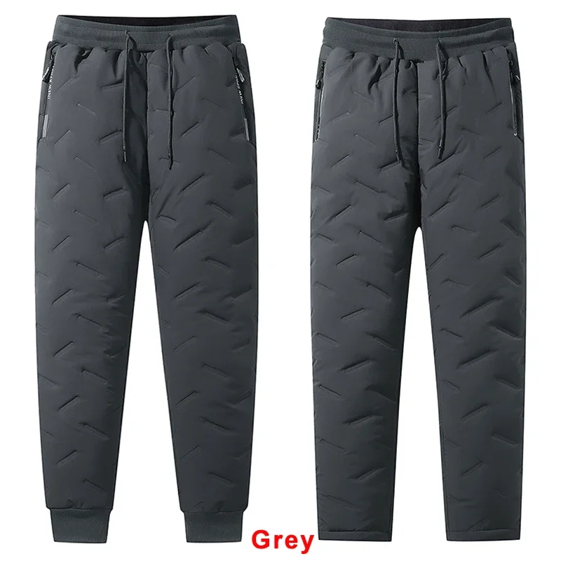 Tasche invernali con Zip addensare pantaloni della tuta in pile da uomo pantaloni da jogging in cotone nero grigio giù pantaloni termici maschili impermeabili 7XL