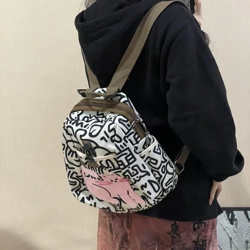 لطيف هريرة قفل مشبك على ظهره المرأة خط طباعة سعة كبيرة حقيبة الظهر النايلون السيدات موضة عادية ركاب Mochilas Mujer