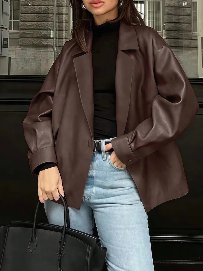 Plus size women's oversized lapel loose PU leather blazer jacket dark brown drop shoulder single button long sleeve draped faux
