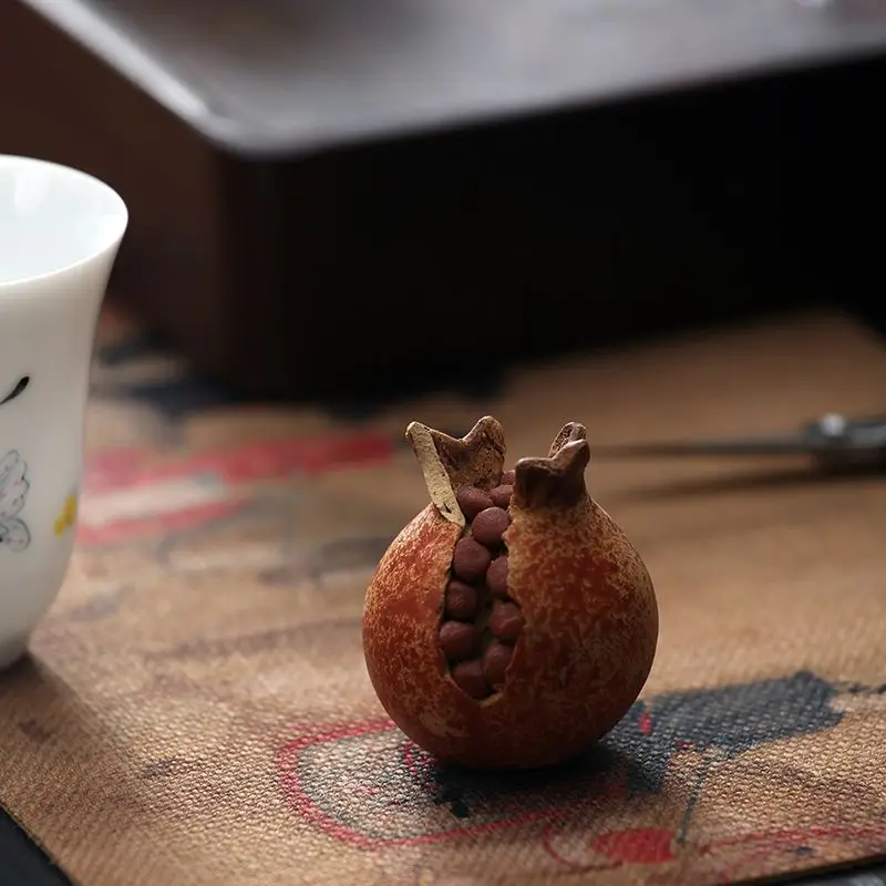 Hand‑made ceramic purple clay pomegranate ornament with split opening, tea decor, symbolizing blessings from many children