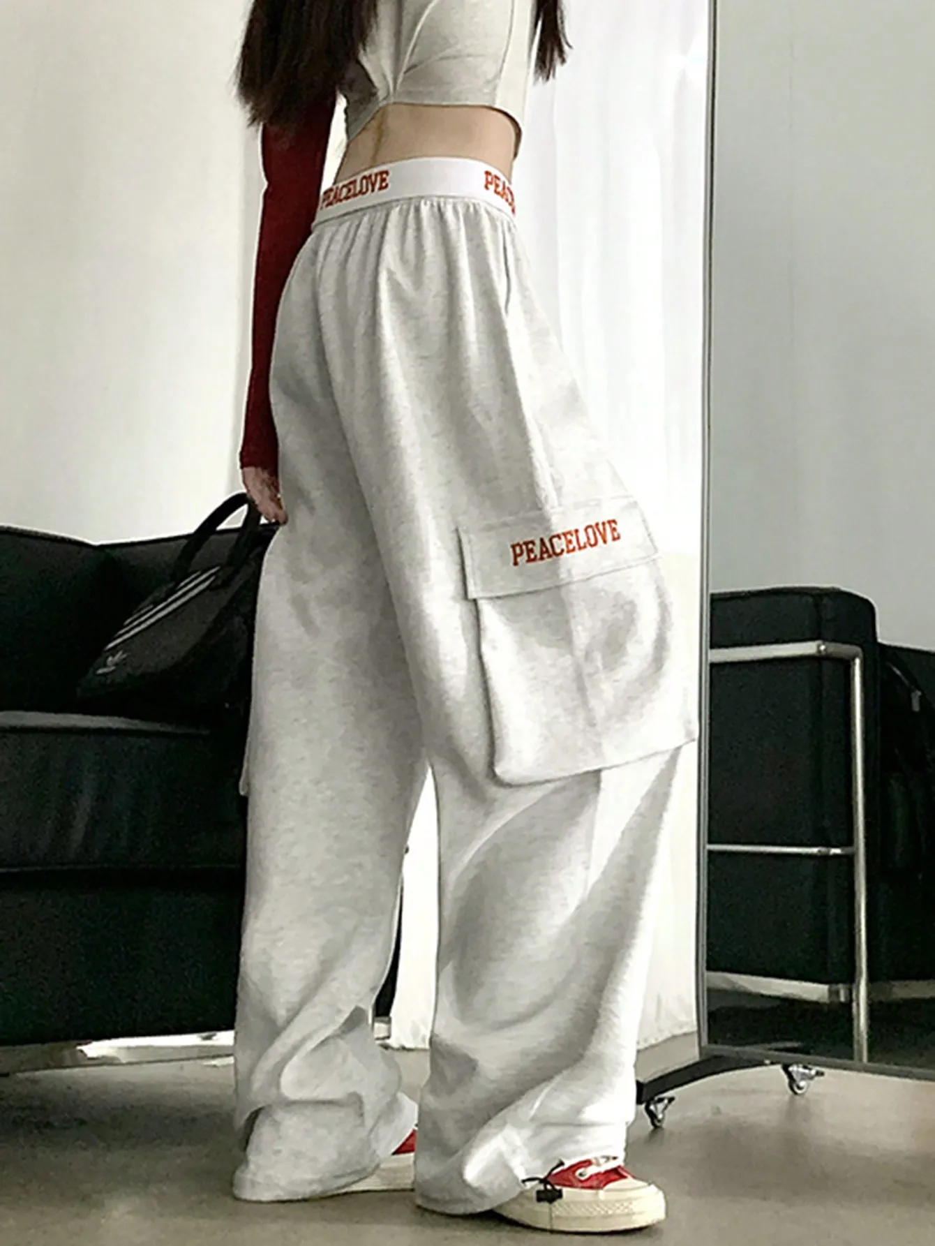 เกาหลี Chic ฤดูใบไม้ร่วงอเมริกัน Retro High Street Drawstring Multi-Flap กระเป๋ากางเกง Sweatpants การออกแบบความรู้สึกของการออกแบบอินเทรนด์สําหรับสตรี