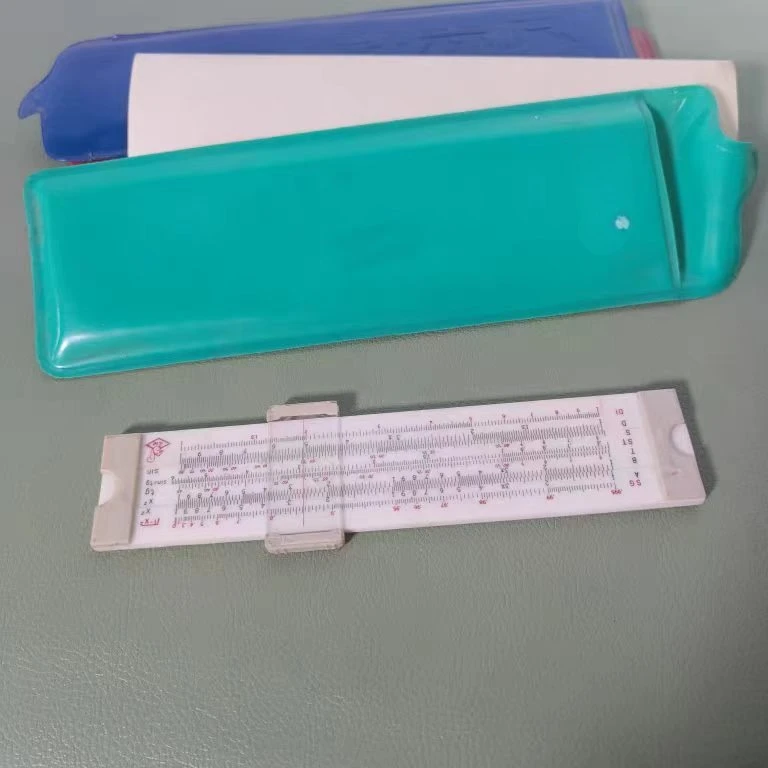 Double-sided logarithmic slide rule, portable calculator with quotation manual