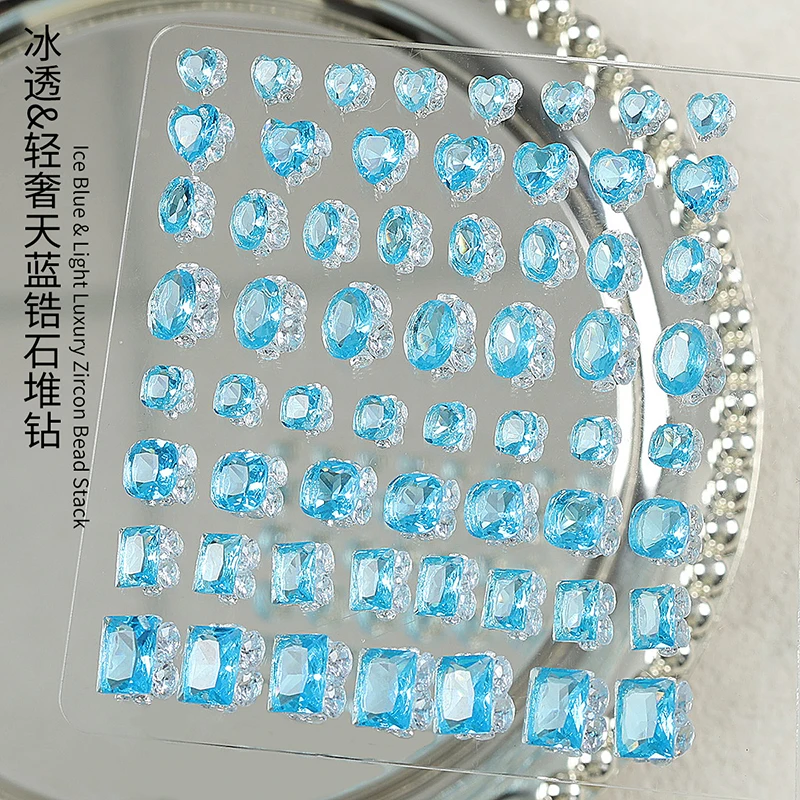 

20PCS Premium Ice Blue Nails Jewelry with Hand-placed Cubic Zirconia, featuring stacked geometric square and heart accents
