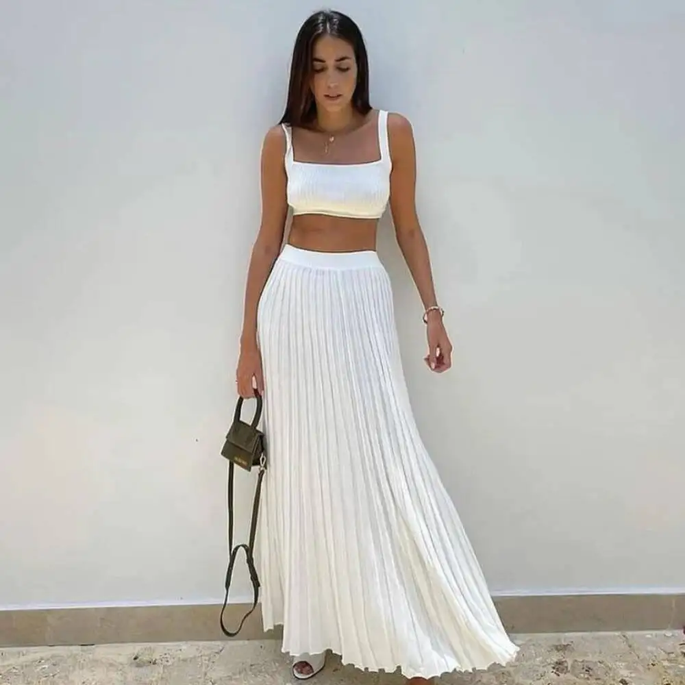

Elegant Knitted Women Crop Top And Maxi Skirt Outfits Summer Casual Solid Bohemia Holiday Beach Two Piece Set 2026