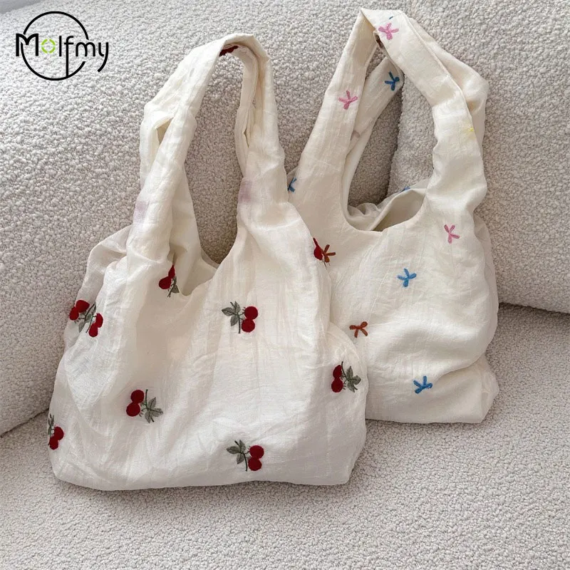 Bolsos de diseñador de lujo con bordado de cereza, bolso de mano de lona para mujer, bolso de hombro para vacaciones en la playa, estilo suave, Marca Lujo 2025