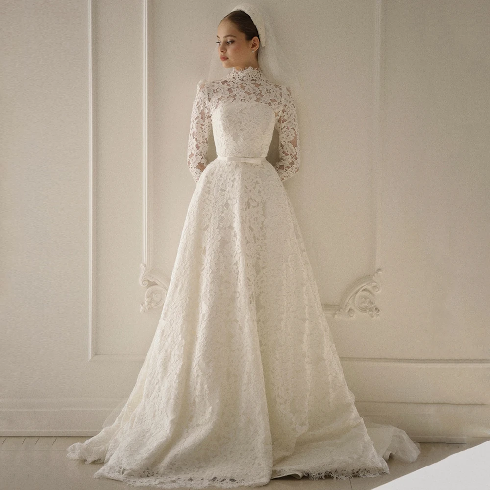 Skromna suknia ślubna szyta na miarę, z wysokim dekoltem, długimi rękawami, kokardą, paskiem, w kształcie litery A, z saudyjskiej koronki, suknia ślubna Vestido De Noiva