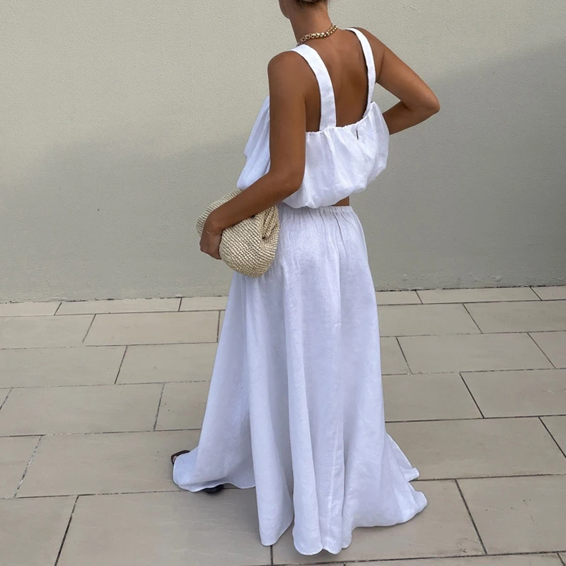 

Летний повседневный свободный комплект из двух предметов: элегантные брюки с высокой талией и простой белый укороченный топ-халтер и длинные брюки-фонарики