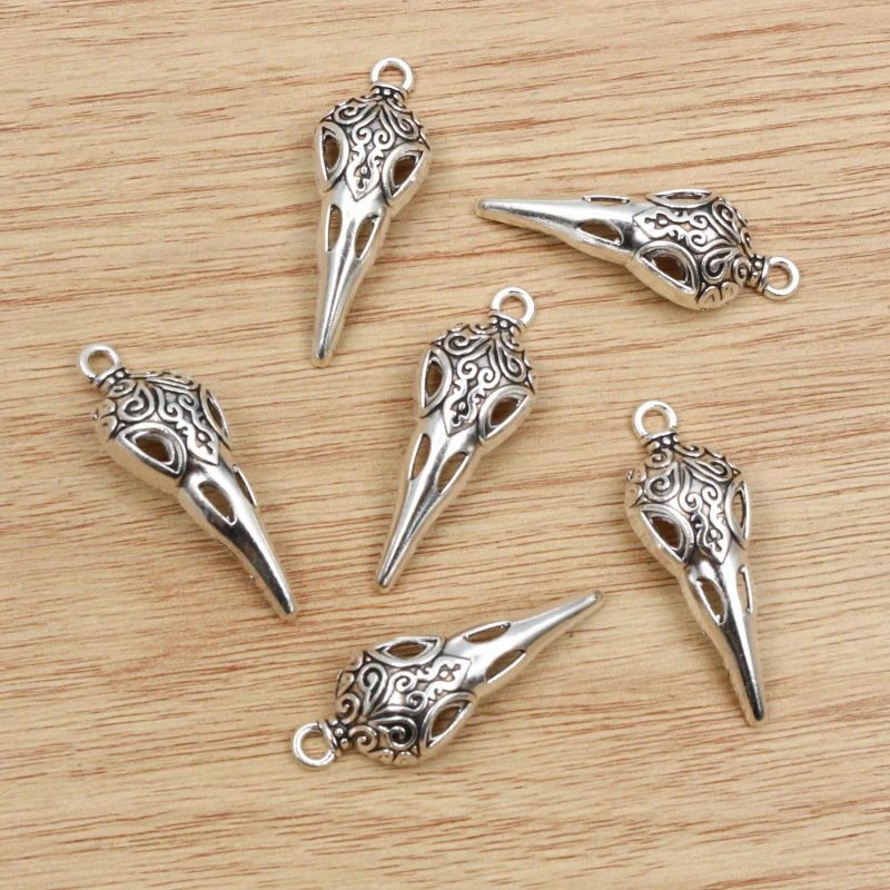 15pcs 35x13mm Antique Argent Plaqué Oiseau Crâne Squelette Chrams Alliage Métallique Pendentif BRICOLAGE Charmes DIY Bijoux faisant des Résultats