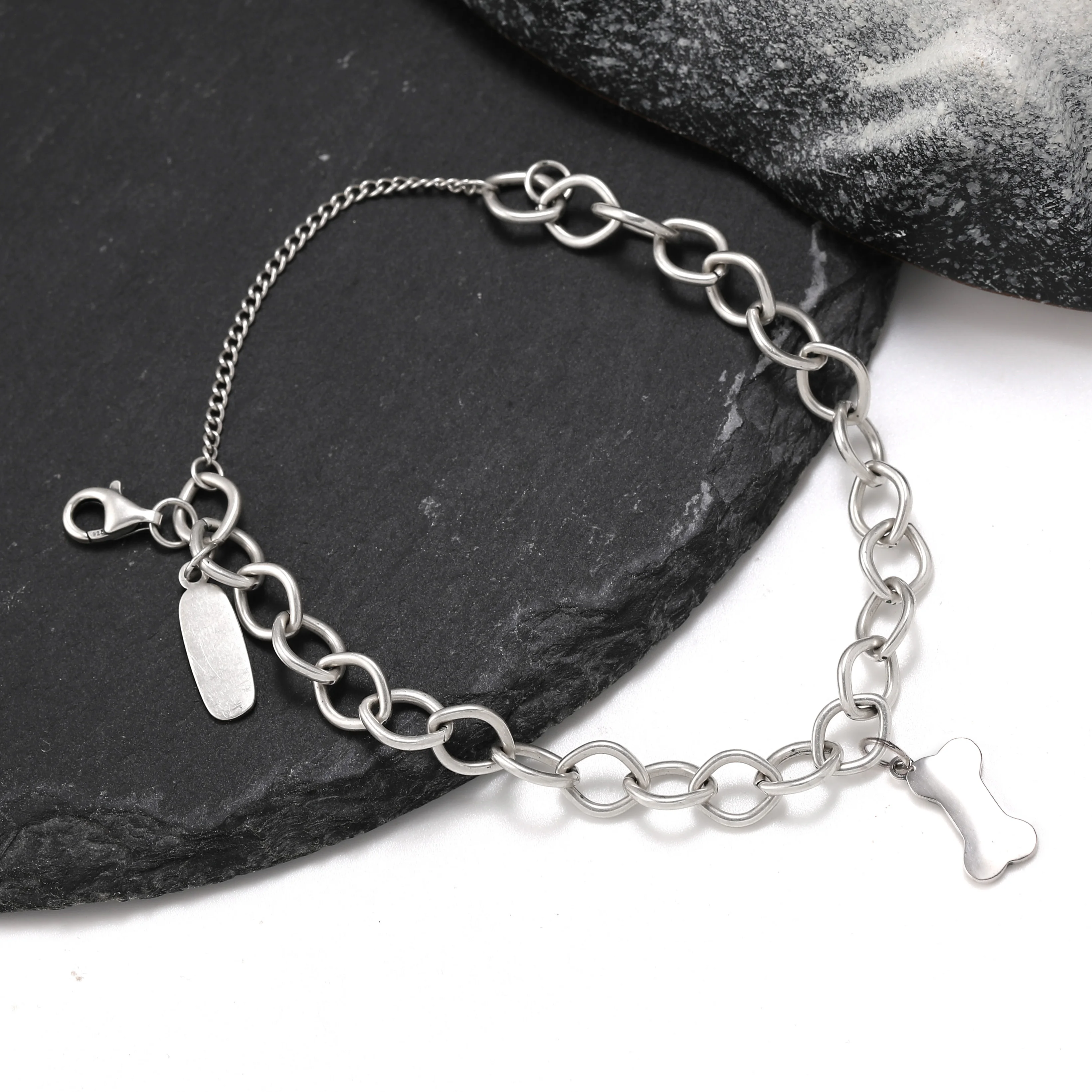 

Genuine 925 sterling silver Forged Link Charm Bracelet paired with Carving dog bones pendant