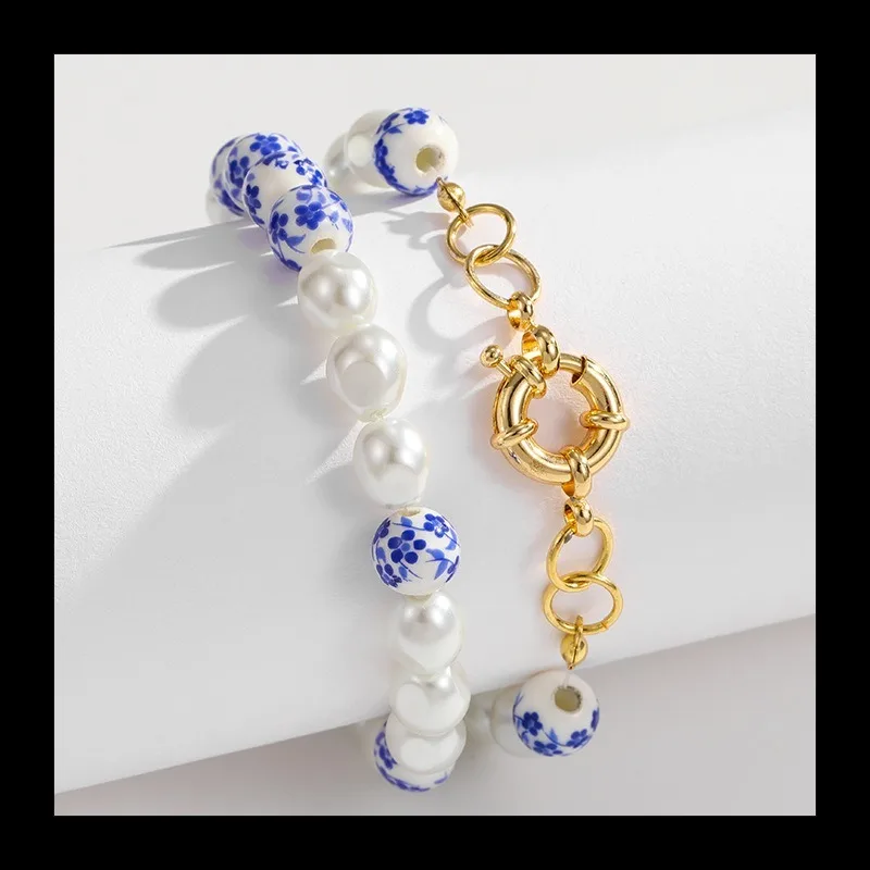 التصميم الأصلي سلسلة الخزف الأزرق والأبيض مطرز السيراميك اللؤلؤ الإناث البولكا نقطة المينا