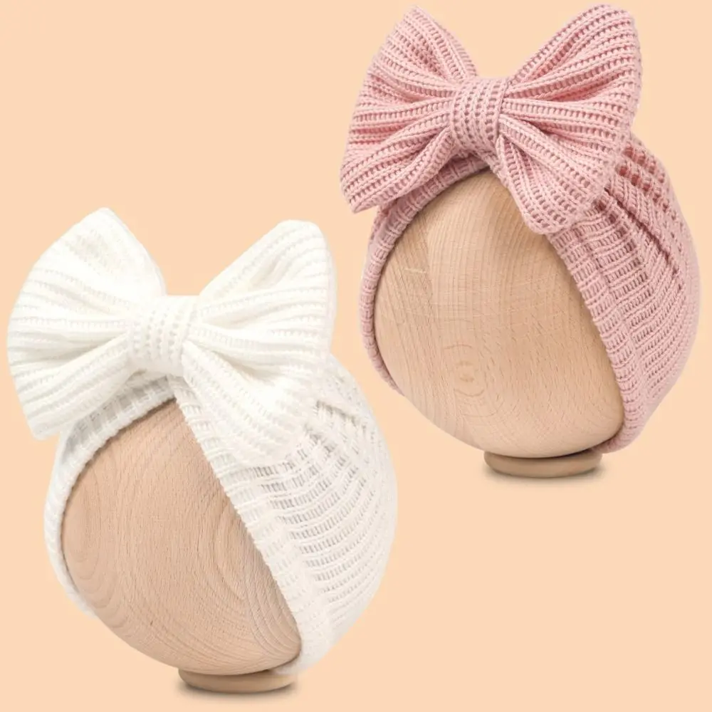 جديد لطيف Bowknot محبوك عمامة بلون دافئ الرضع قبعة قبعة مطاطا البلوز كاب Headerap