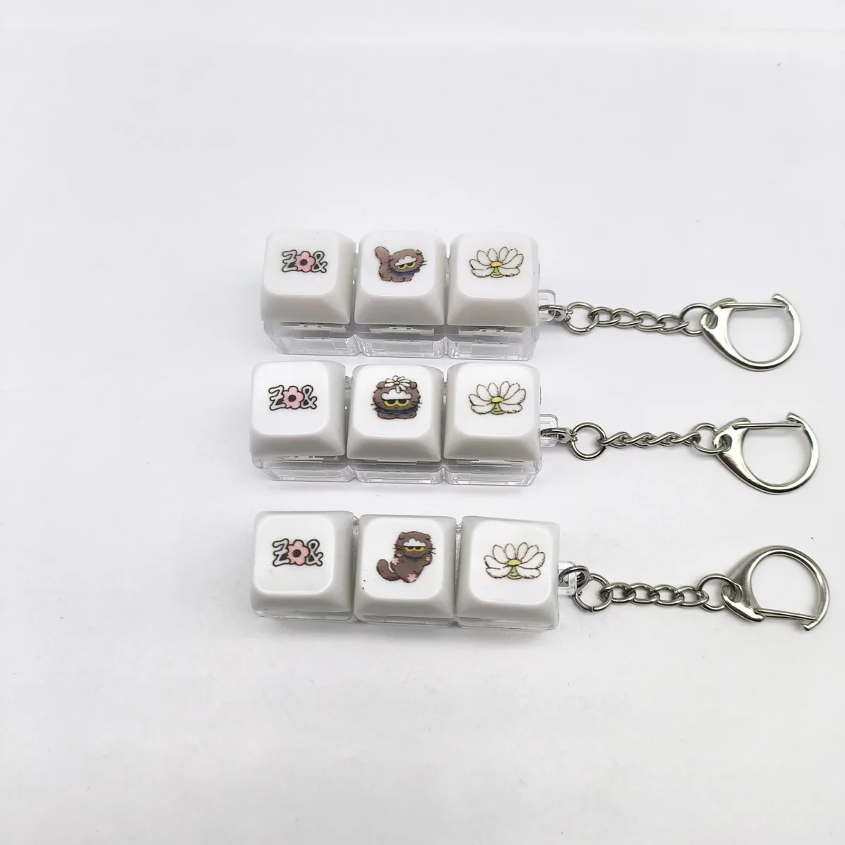 

K-pop group ZOA sensory stress-relieving toy, pressing device keychain pendant, fan group purchase gift shines brightly 2026