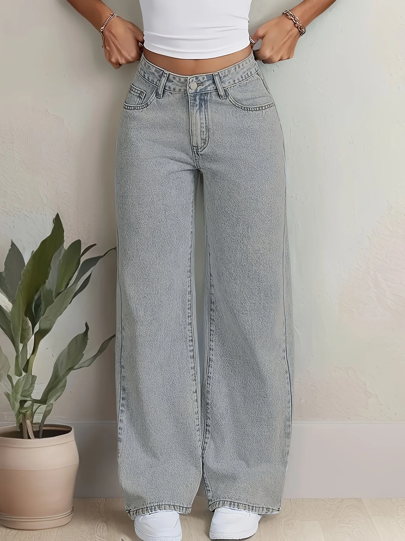 Hellblaue, hoch taillierte, gerade Vintage-Jeans mit Schleifenstickerei