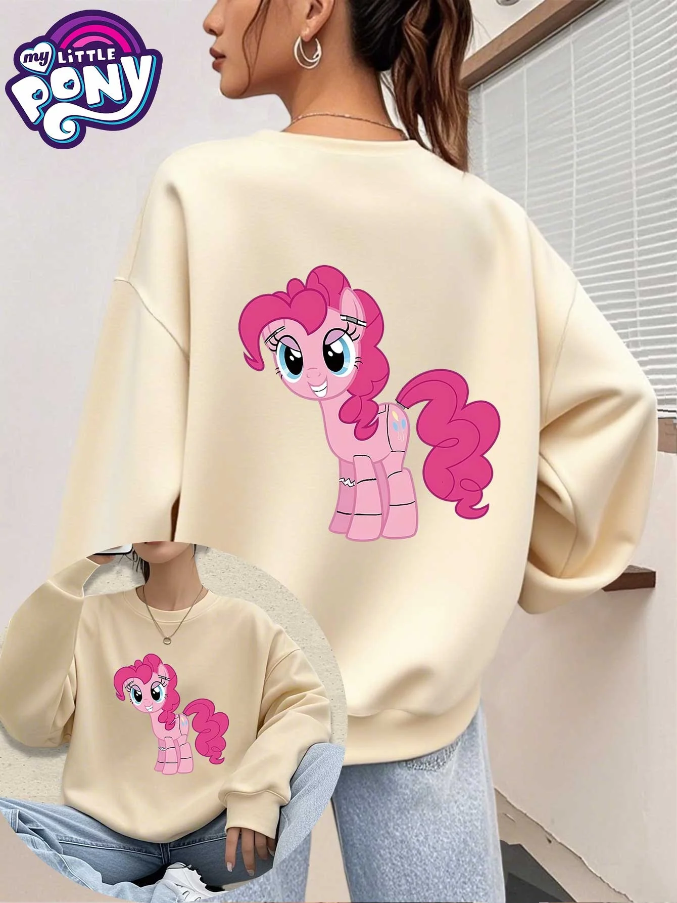 

A One-Piece Winter Women'S Round-Neck Sweatshirt Featuring a Cute Pony Smile Print from 'My Little Pony' in Pink Party Style