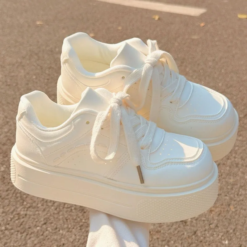 Thick soled skateboarding white shoes, solid color, thick and raised sole, lace up, minimalist style, street daily casual board