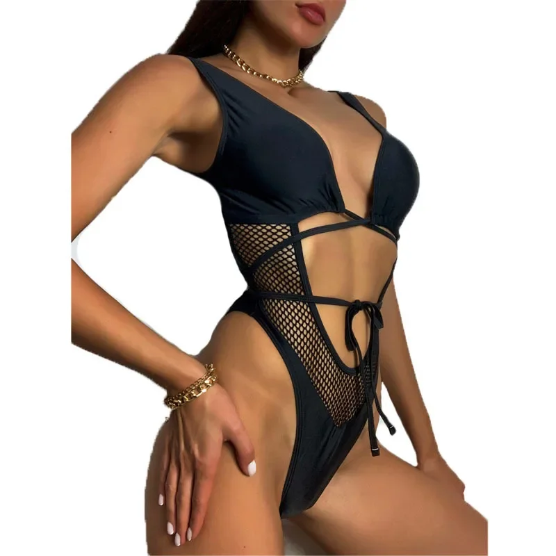Euro-american swimsuit black mesh hollowed out lace-up one-piece swimsuit sexy tight swimsuit bikini spot wholesale